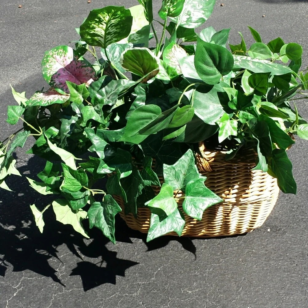 Faux plants in a wicker basket